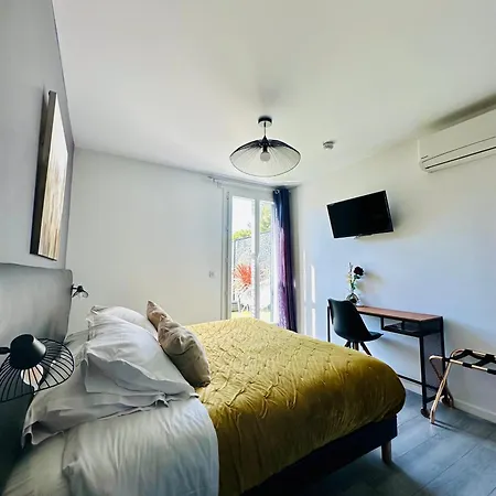 Отель Eden - Centre-ville- Piscine Chauffee, Jacuzzi Et Sauna - Parking Prive